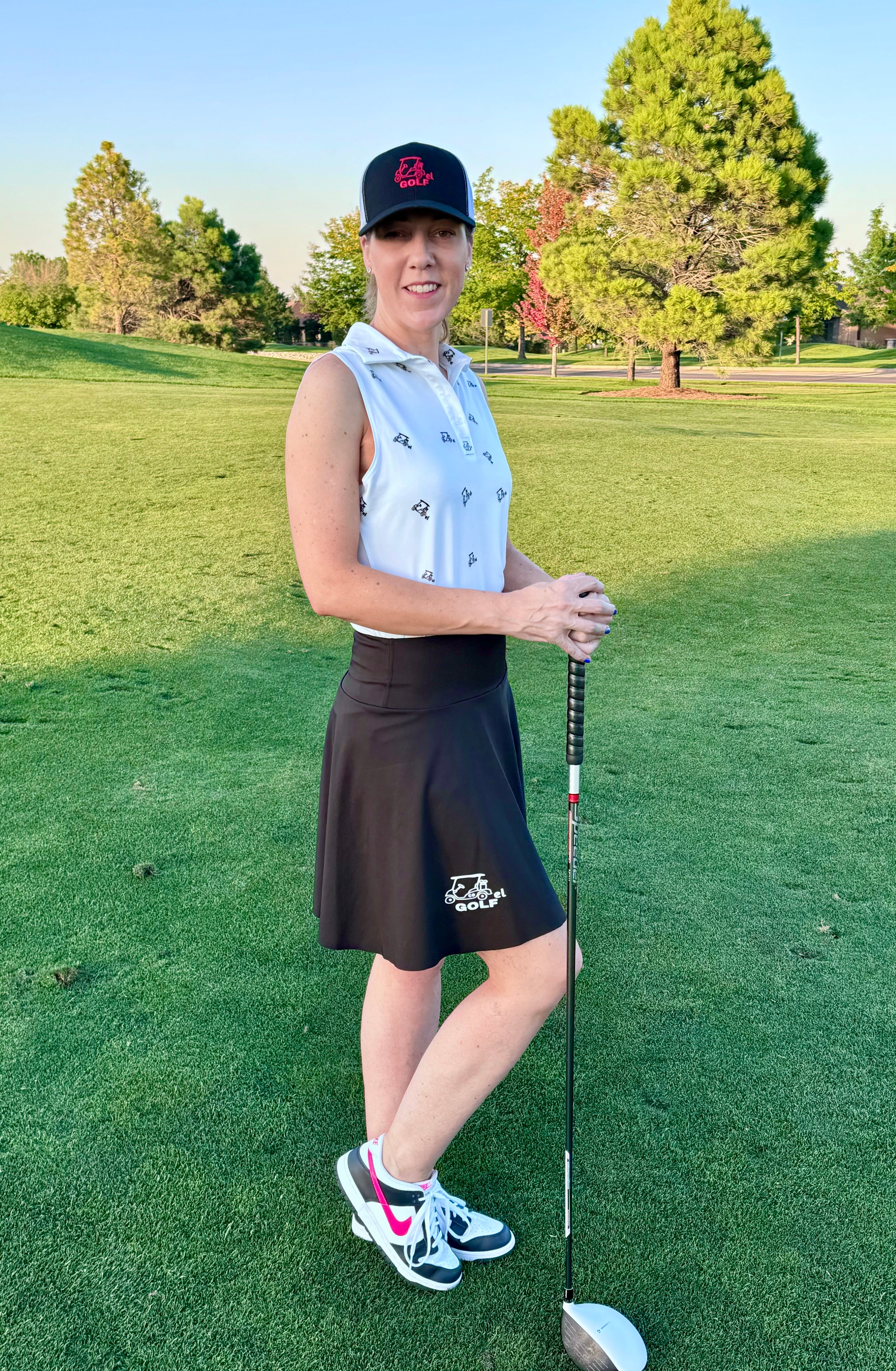 Cartel Golf's Signature White Sleeveless Women's Polo